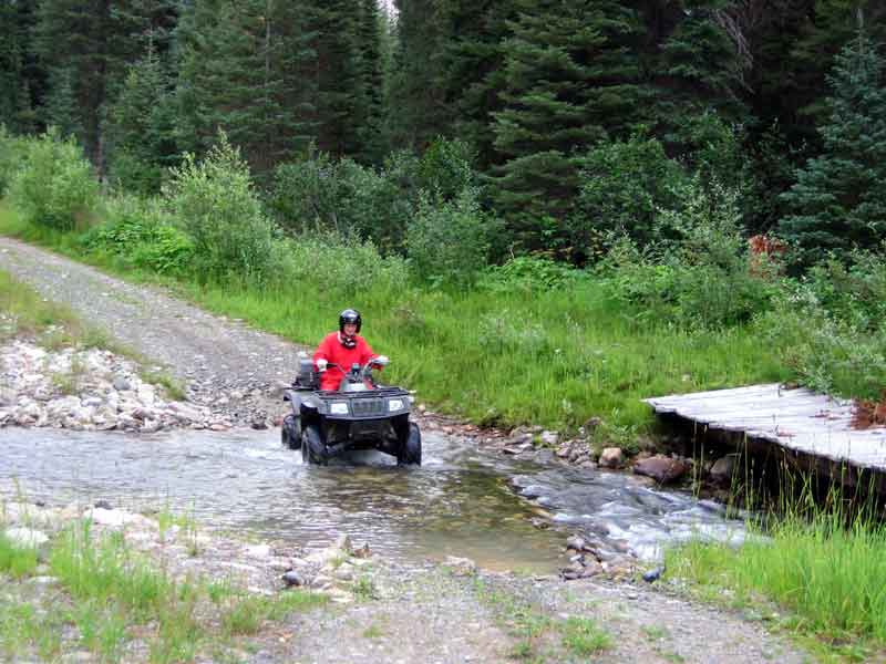 Anne fording a stream