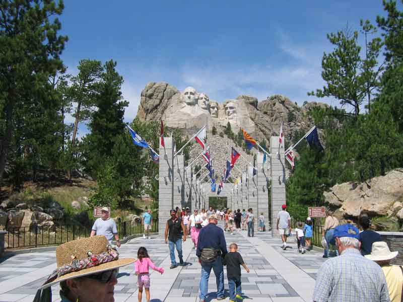 Main entrance at Mt. Rushmore with all the State's flags